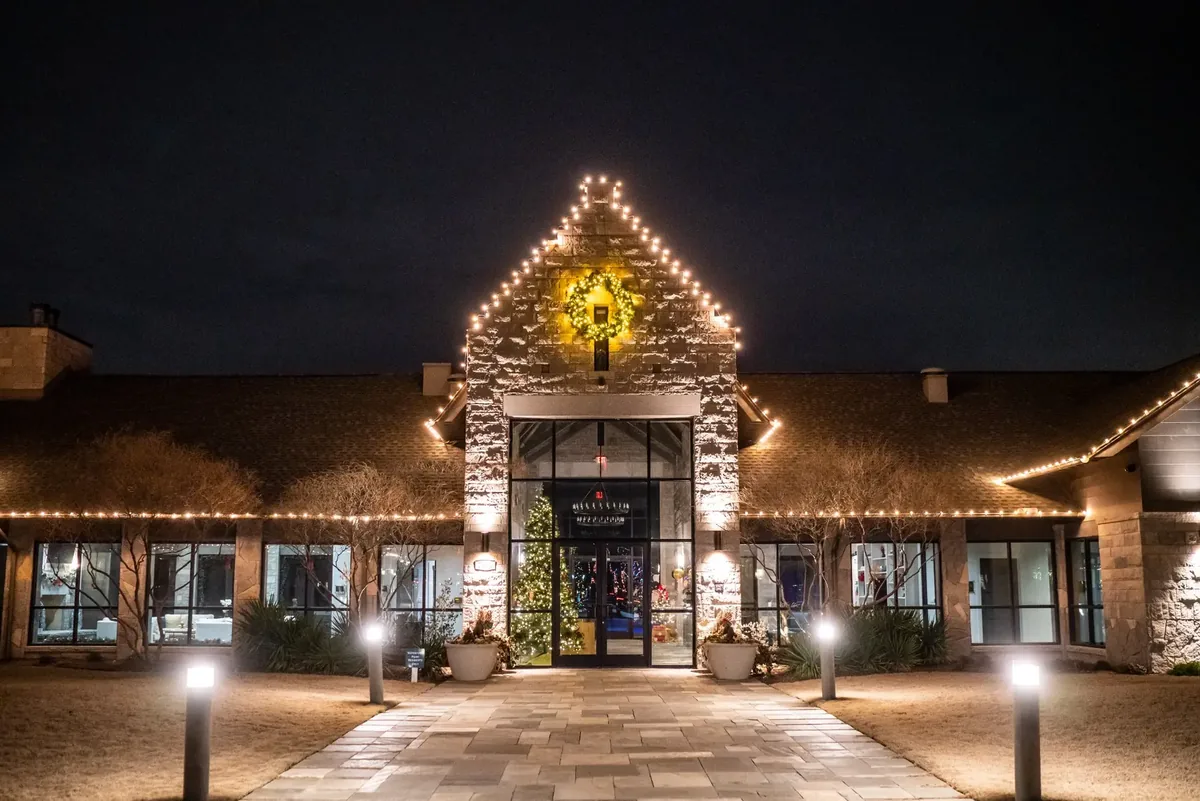 Commercial holiday entrance with illuminated architectural and decorative features