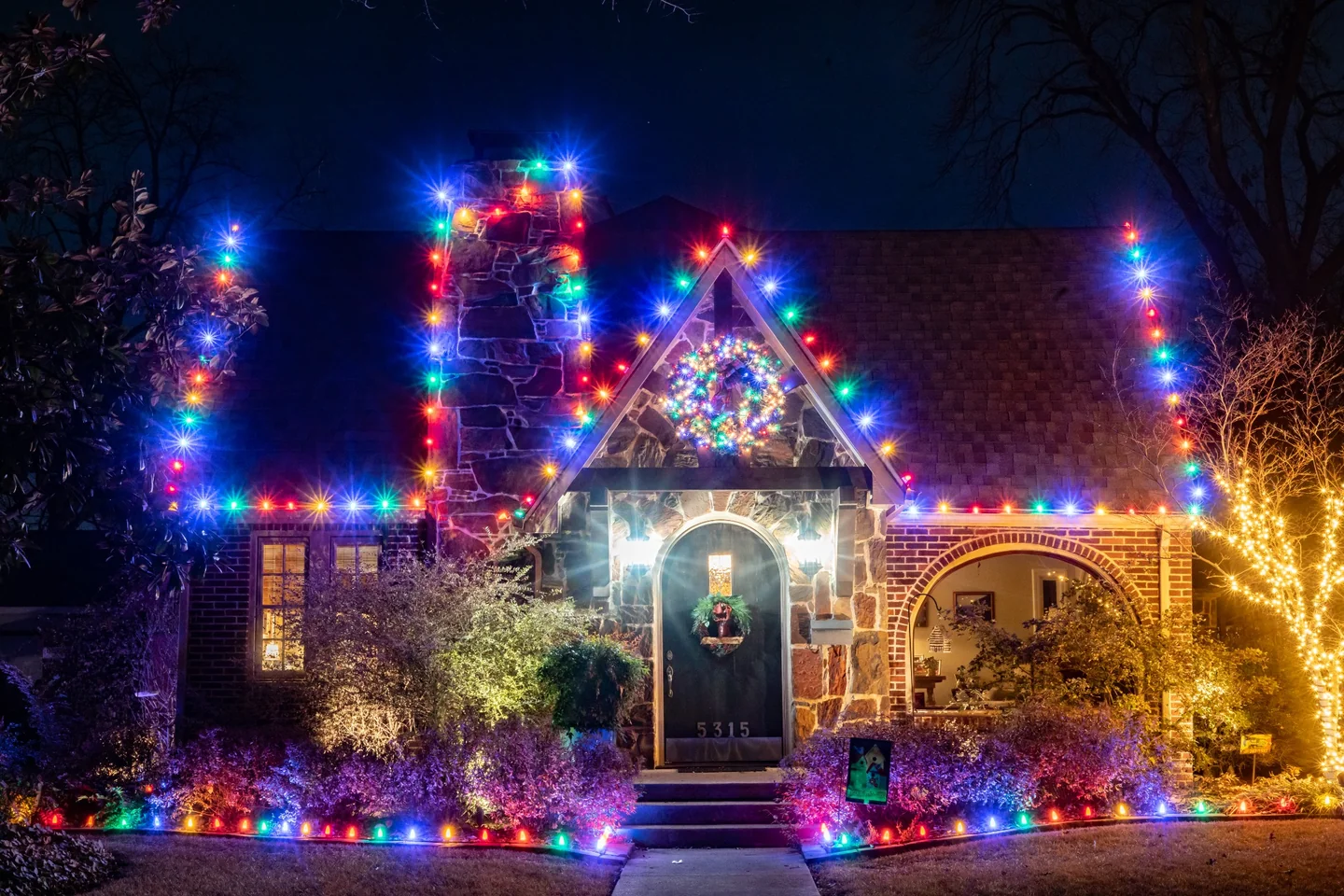 Home decorated with a clean classic multicolor Christmas light design